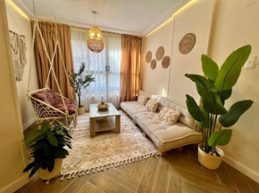 Boho 2BR Apartment with Garden View